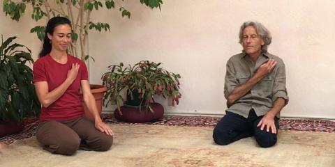 Alexis Mulhauser and Jon Schreiber practicing Self-Breema exercises