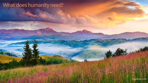 Colorful mountainous landscape and vibrant clouds at sunset.