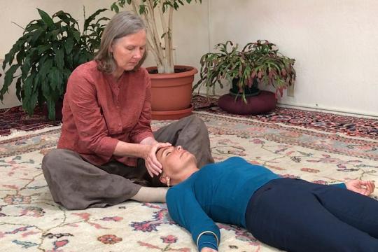 Birthe Kaarsholm doing Breema bodywork