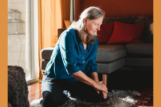 Birthe Kaarsholm doing Self-Breema at home